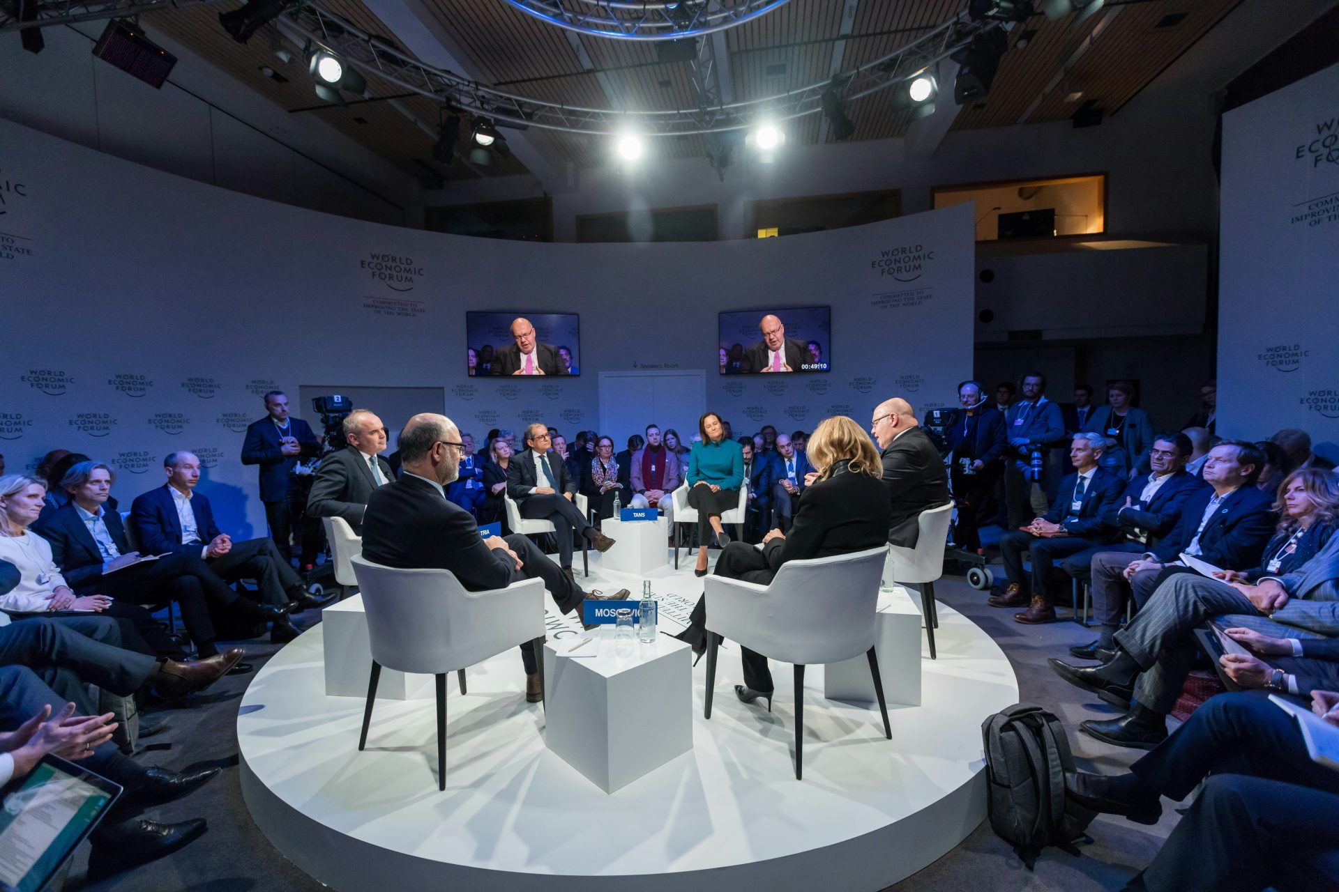 Roundtable discussion with business leaders present.
